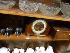 Polished mantel clock, ebony elephants, stationery box