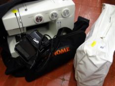 Bagged Janome electric sewing machine, model no. 1580 E/T