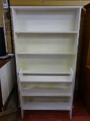Large white painted freestanding open bookcase of five shelves and a smaller bookcase