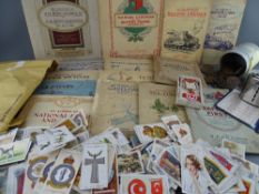 Collection of loose and mounted cigarette cards, quantity of vintage coinage, boxed Red Cross