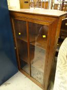 Two glazed corner cabinets