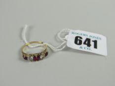 18ct gold ruby & diamond carved ring (7 x chips missing) (diamonds estimated at 0.68ct)