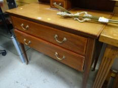 An inlaid mahogany dressing table (faded)