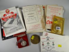 Parcel of Welsh rugby ephemera including programmes, photographs & a believed silver medallion etc