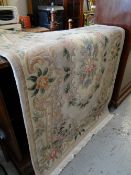 A Chinese washed floral carpet