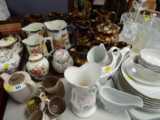 A collection of lustre jugs, Poole teaset etc