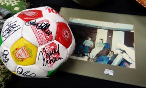 A signed Liverpool football, a signed Kenny Dalglish photograph