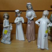 Four Lladro figures of children