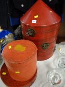 A Chinese conical shaped reproduction lacquer ware hat box & two further similar Oriental containers