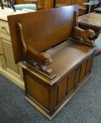 A linen fold monk's bench with box seat