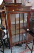 A single-door Edwardian china cabinet