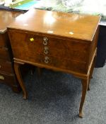 A three-drawer cutlery cabinet with an Oneida cutlery set & other loose flatware