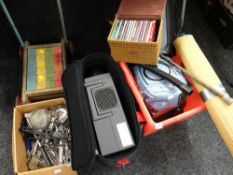 A parcel of items including kitchen cutlery, small electricals, child's block walker, CDs etc