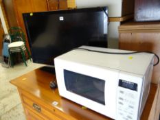 A Sony Bravia flatscreen TV & a microwave E/T
