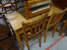 A vintage lightwood school desk for two children with chairs