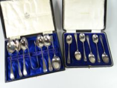 Two cased sets of hallmarked silver teaspoons, one with sugar nips