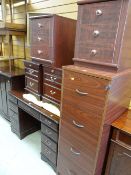 A wood effect filing cabinet, two pairs of bedside drawers etc