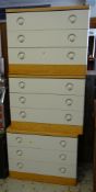 Three mid twentieth century three-drawer chests with plastic covered drawers