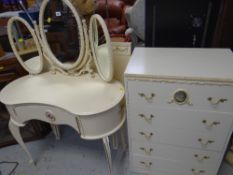 A painted French-style kidney shaped dressing table with tri-fold mirror & matching chest of