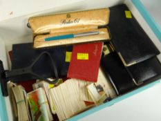 Folder of mixed items including cigarette cards, wallets, Parker pen, autograph book etc
