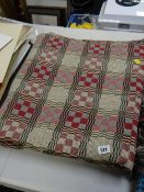 A geometric patterned woollen blanket