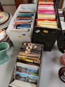 Collection of various vintage ordnance survey maps together with a box of vintage postcards