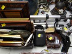 A parcel of camera equipment, tripod, parcel of frames etc