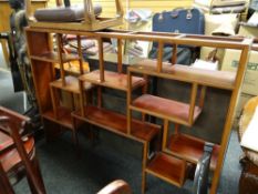 An Oriental hardwood staggered open bookcase