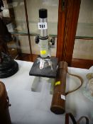 An Opax microscope together with a vintage leather cased telescope