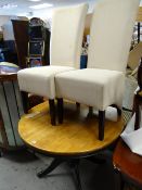 A circular breakfast table & two chairs