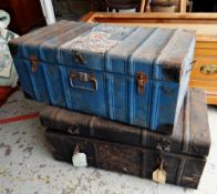 Two vintage metal trunks