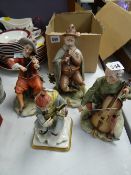Three Naplesware figures of musicians & another