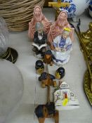 Group of ornamental pottery figurines, small Staffs cottage etc