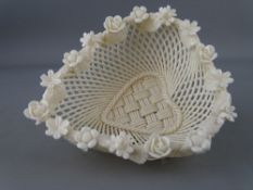 Belleek pottery reticulated basket with floral decoration