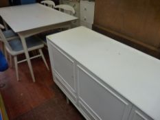 Habitat style white extending dining table, four chairs and matching sideboard