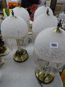 Five matching decorative table lamps with pendant and beadwork lustre shades