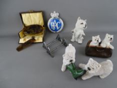 Pair of EP knife rests, RAC car badge, quantity of Westie figurines etc