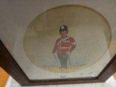 Framed oval watercolour - full length portrait study of a man in regimental dress, indistinctly