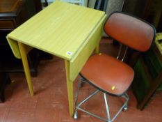 Small melamine drop leaf table and a retro style office chair