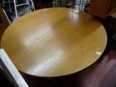 Circular extending dining table