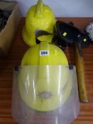 1980's North Wales Fire Service helmet and one other along with a vintage fireman's axe in leather
