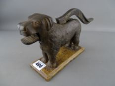 Large Victorian cast iron dog nutcracker on a rectangular wooden base