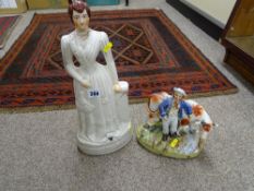 Staffs flatback figure titled 'Princess May' and a cow and figure group over a stream (damages)