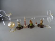 Two Venetian type glass jugs, two scent bottles and three Country Artist owl figurines under glass