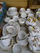 Mixed selection of vintage floral and fruit decorated teaware
