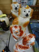 Two pairs of Staffs pottery comforter dogs