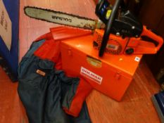 Dolmar PS-52 petrol chainsaw in metal carrybox along with Oregon chainsaw jacket