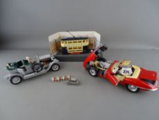Burago model of a 1961 Jaguar E, a 1986 Franklin Mint Rolls Royce Silver Ghost, a Corgi diecast tram