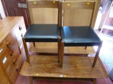 Two stylish coffee tables with bentwood tops and a pair of Danish teak side chairs
