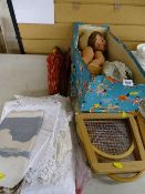 Vintage doll (distressed) in a Pedigree box and two tennis racquets